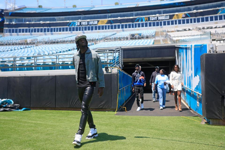 Jacksonville Jaguars wide receiver Brian Thomas Jr. arrives on the field before a press conference Friday, April 26, 2024 at EverBank Stadium’s Miller Electric Center in Jacksonville, Fla. Jacksonville Jaguars selected LSU’s wide receiver Brian Thomas Jr. as the 23rd overall pick in last night’s NFL Draft. [Corey Perrine/Florida Times-Union]