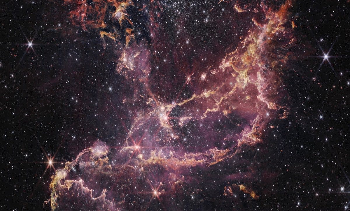 NGC 346, shown here in this image from NASA’s James Webb Space Telescope Near-Infrared Camera (NIRCam), is a dynamic star cluster that lies within a nebula 200,000 light years away (SCIENCE: NASA, ESA, CSA, Olivia C. Jones (UK ATC), Guido De Marchi (ESTEC), Margaret Meixner (USRA)  IMAGE PROCESSING: Alyssa Pagan (STScI), Nolan Habel (USRA), Laura Lenkić (USRA), Laurie E. U. Chu (NASA Ames) )
