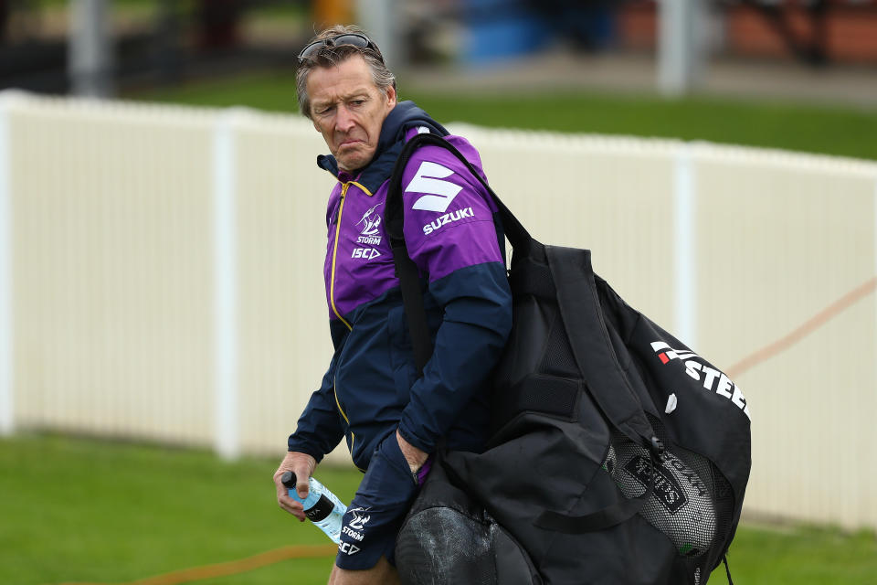 Storm coach Craig Bellamy walks to training.