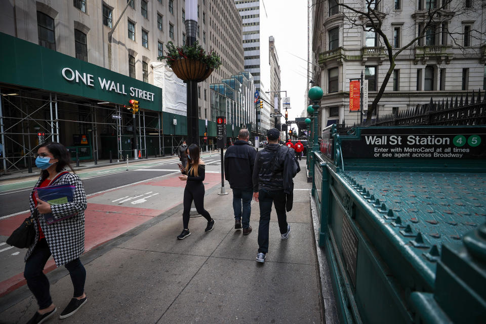 NEW YORK, USA - MARCH 25: People are seen by the Wall Street Station during COVID-19 pandemic in New York City, United States on March 25, 2021. (Photo by Tayfun Coskun/Anadolu Agency via Getty Images)