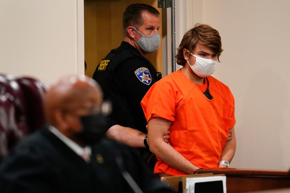 Payton Gendron is led into the courtroom for a hearing at Erie County Court, in Buffalo, N.Y., Thursday, May 19, 2022. Gendron faces charges in the May 14  fatal shooting at a supermarket. (AP Photo/Matt Rourke) ORG XMIT: NYMR106