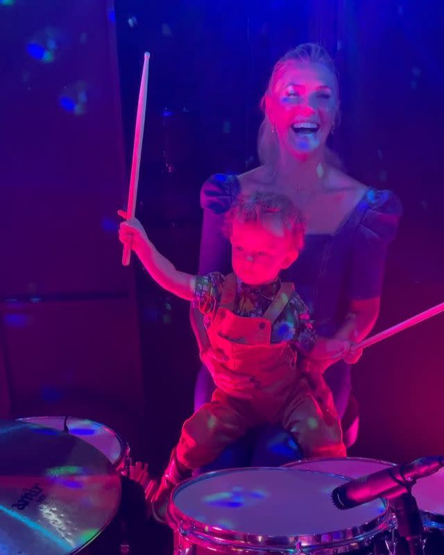 <p>The then 2-year-old seemed to have taken to the drumset with ease — and Mom couldn't have been more proud.</p>
