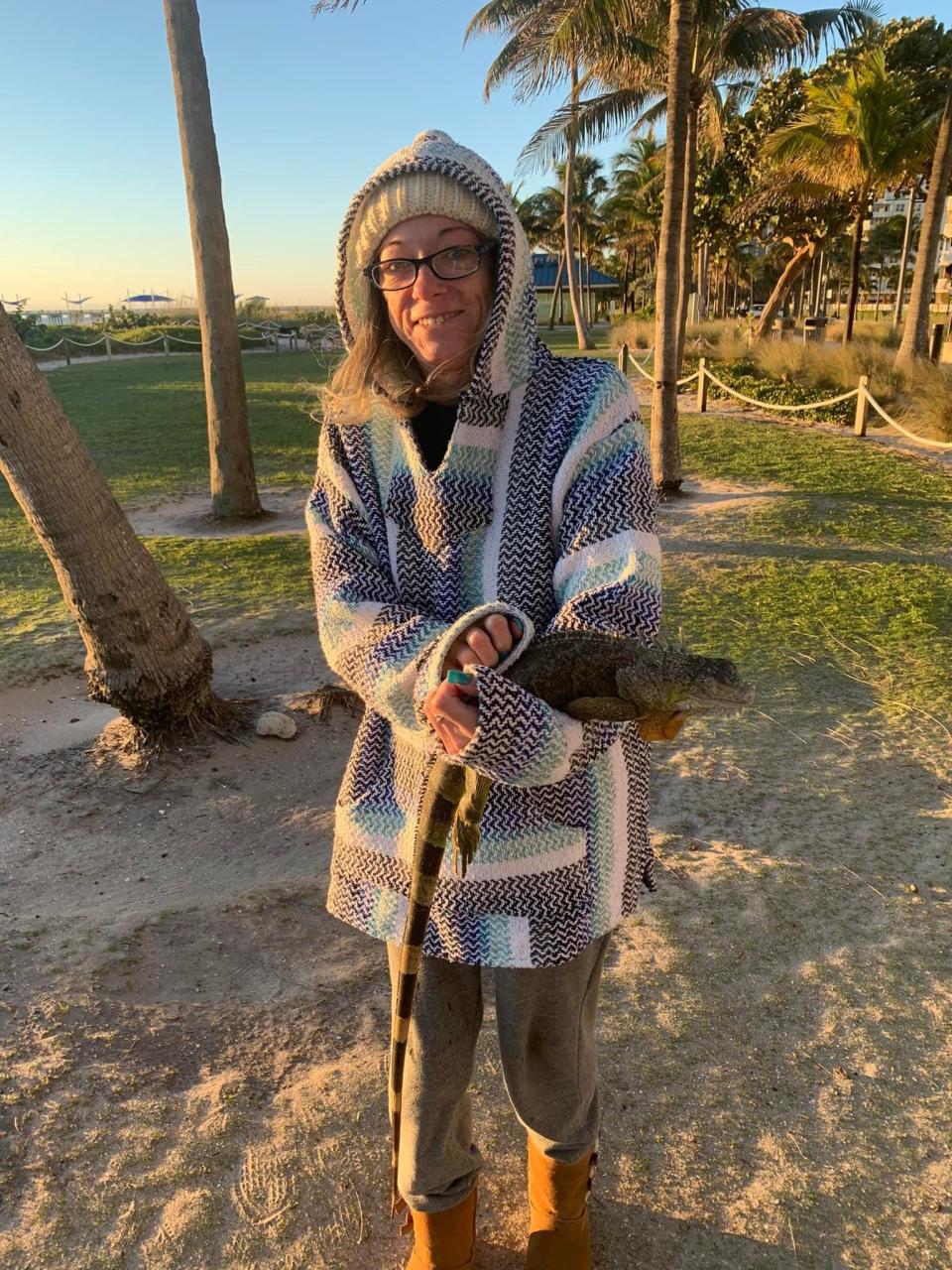 Kathy Hillard Dimpflmaier of Pompano Beach encountered a frozen iguana Jan. 30, 2022, after the season's coldest temperatures were recorded.