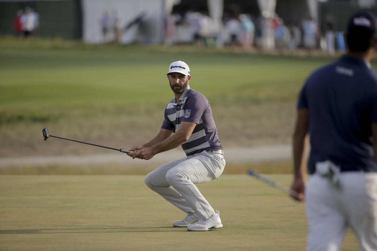 Dustin Johnson reacts after missing a putt on the 15th green during the third round of the U.S. Open. (AP)