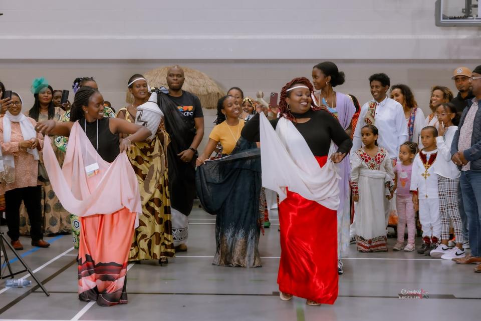 Women show off their Rwandan culture during a mini fashion show.