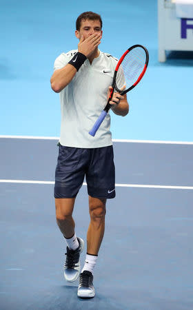 Tennis - ATP World Tour Finals - The O2 Arena, London, Britain - November 13, 2017 Bulgaria’s Grigor Dimitrov celebrates winning his group stage match against Austria’s Dominic Thiem REUTERS/Hannah McKay