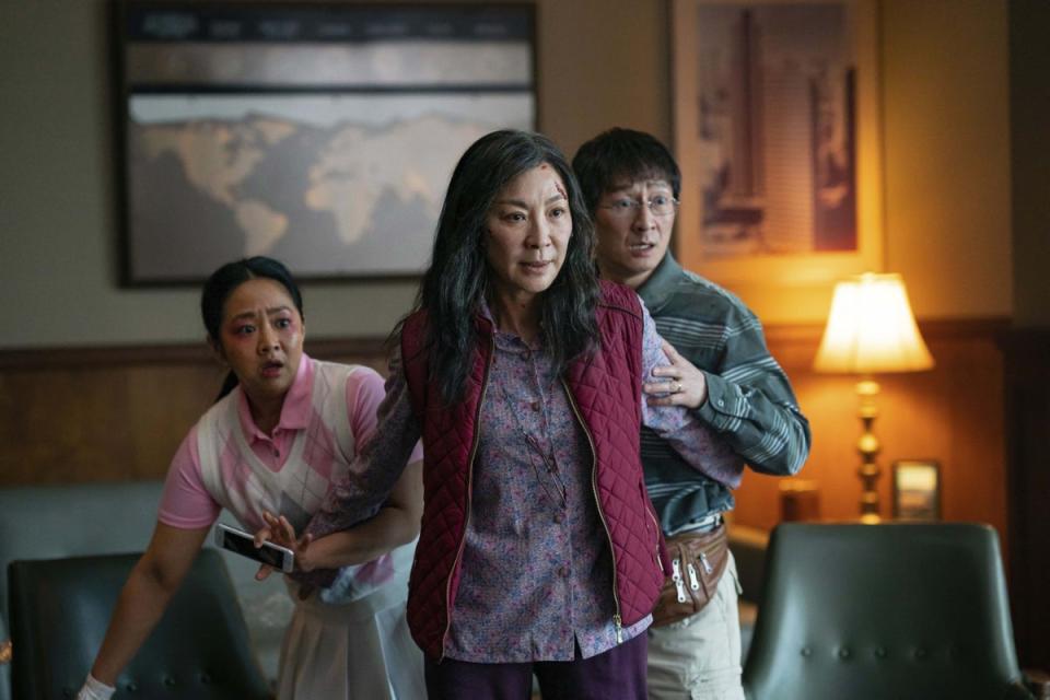 Stephanie Hsu, Michelle Yeoh and Jonathan Ke Quan in ‘Everything Everywhere All at Once' (Moviestore/Shutterstock)
