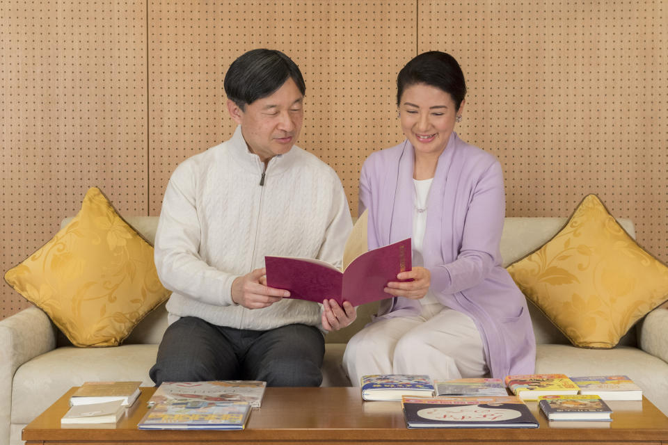 In this Feb. 17, 2019, photo provided by the Imperial Household Agency of Japan, Japan's Crown Prince Naruhito and Crown Princess Masako read the information on the national youth book report competition at their residence Togu Palace in Tokyo. Naruhito celebrates his 59th birthday on Saturday, Feb. 23, 2019. (Imperial Household Agency of Japan via AP)
