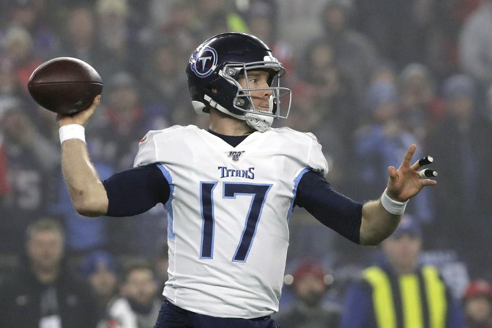 Tennessee Titans quarterback Ryan Tannehill passes against the New England Patriots in the first half of an NFL wild-card playoff football game, Saturday, Jan. 4, 2020, in Foxborough, Mass. (AP Photo/Elise Amendola)