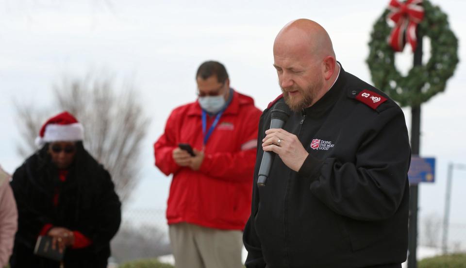 Major David Phelps with the Salvation Army says a prayer during the Homeless Persons' memorial Day proclamation and memorial service held at the Rotary Centennial Pavilion Tuesday morning, Dec. 21, 2021.
