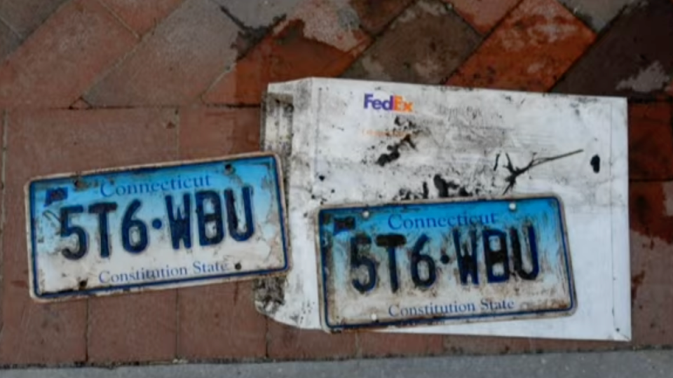 An envelope containing two Connecticut license plates was found in the storm drain (Law & Crime)