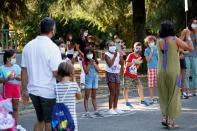 Children return to school for the first time since March, in Rome