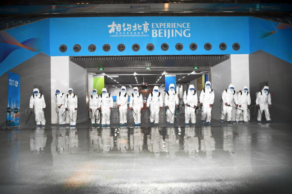 Workers disinfect the National Indoor Stadium on April 12, 2021 in Beijing, China.<span class="copyright">Hei Jianjun/Beijing Youth Daily/VCG via Getty Images</span>