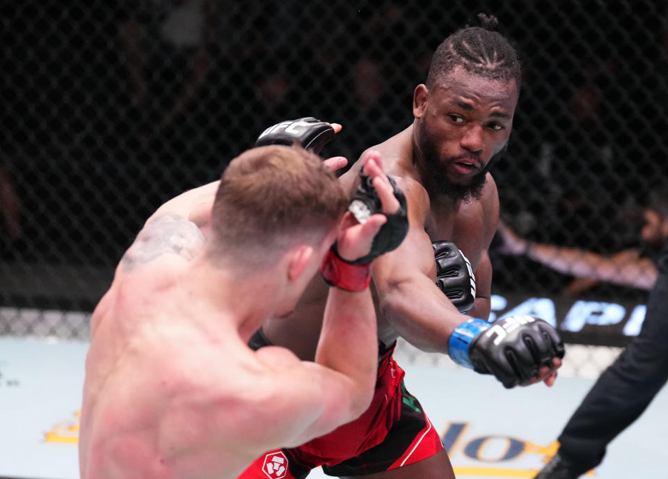 LAS VEGAS, NEVADA – DECEMBER 17: (R-L) Manel Kape of Angola punches David Dvorak of the Czech Republic in a flyweight fight during the UFC Fight Night event at UFC APEX on December 17, 2022 in Las Vegas, Nevada. (Photo by Chris Unger/Zuffa LLC)