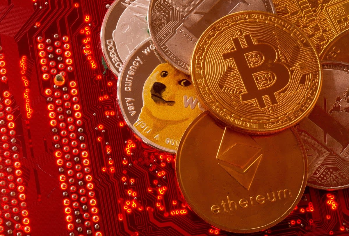 Representations of cryptocurrency Dogecoin (REUTERS)