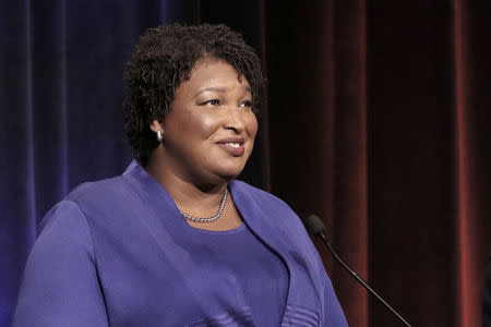 FILE PHOTO: Democratic gubernatorial candidate for Georgia Stacey Abrams speaks during a debate with Republican opponent Secretary of State Brian Kemp (not shown) in Atlanta, Georgia, U.S, October 23, 2018. John Bazemore/Pool via REUTERS/File Photo