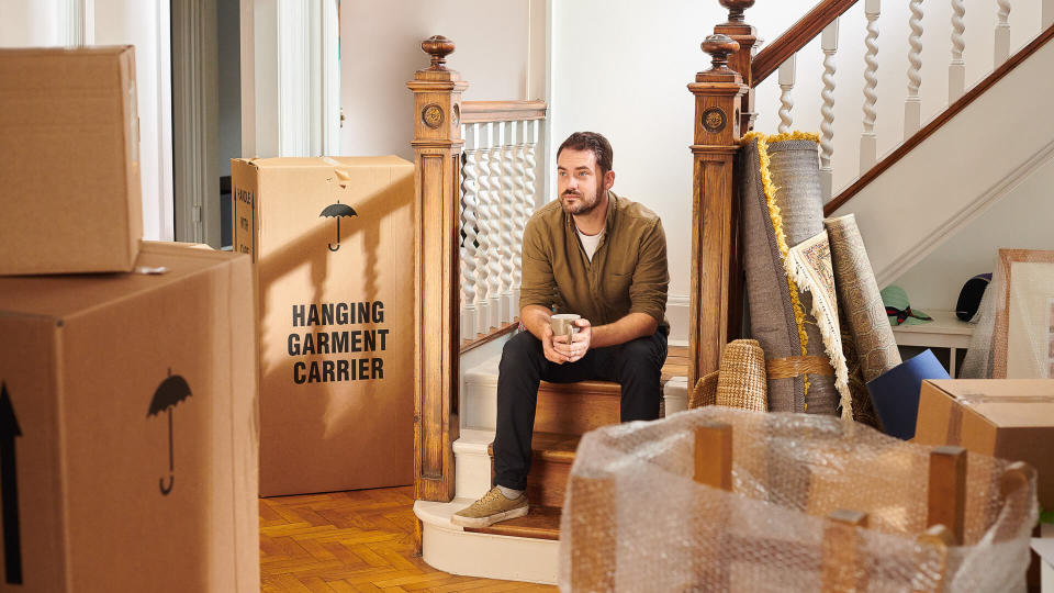 man waiting for the removal van for his share of the family home.