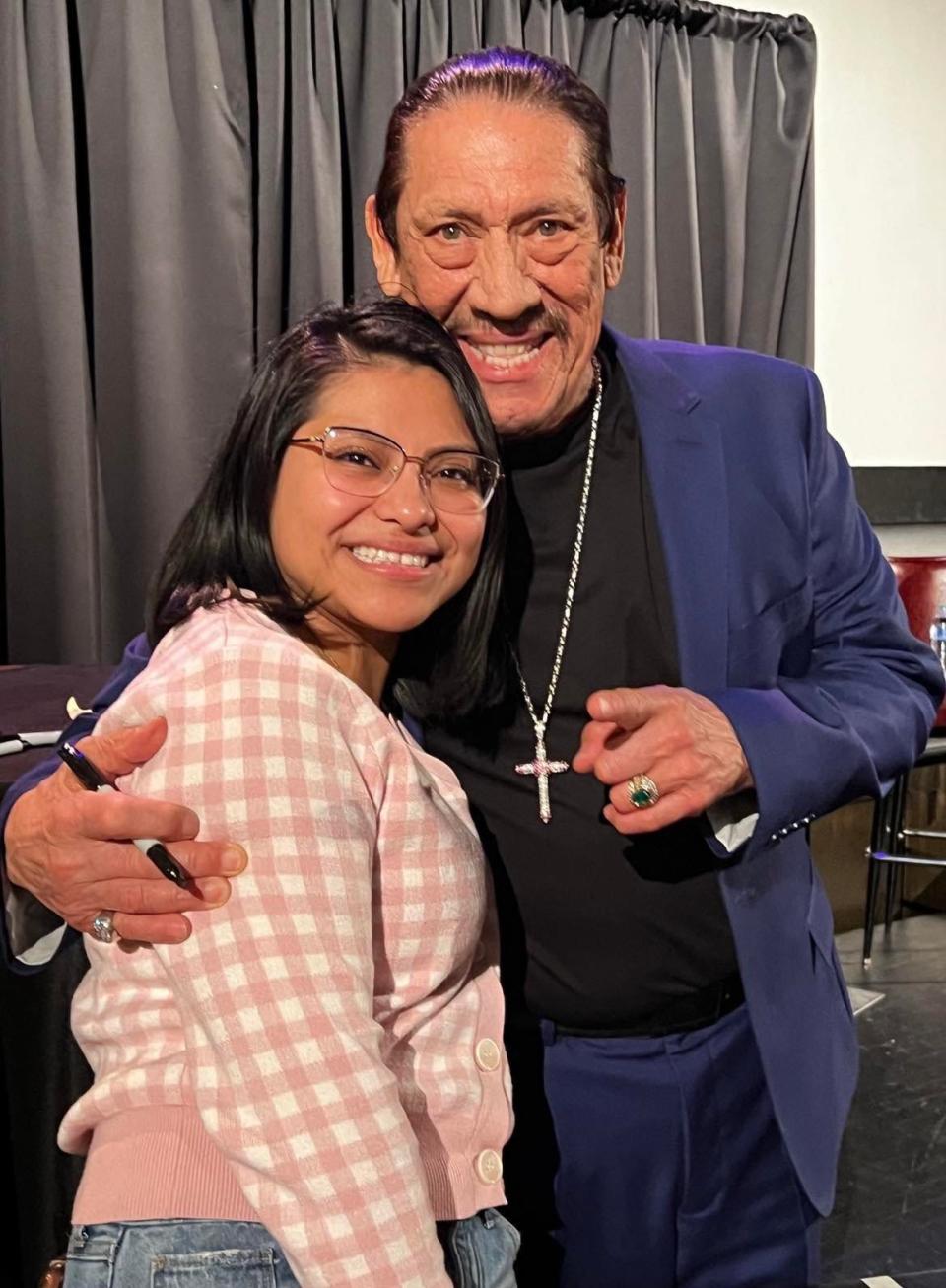 Danny Trejo is shown with a fan at his meet and greet following his presentation Thursday night at Canton Palace Theatre. Trejo, an actor, author and restauranteur, spoke at a joint event of the Stark Library and Kent State University at Stark.