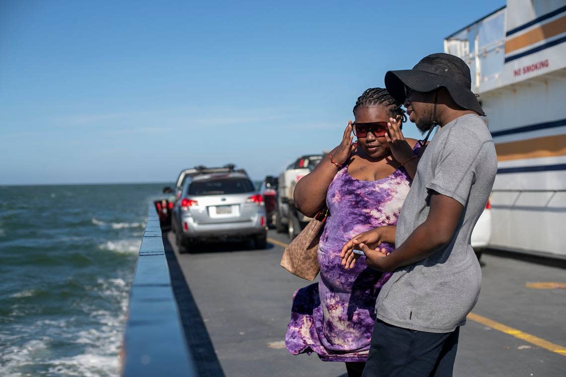 Nazir Jones and Nahjae Chapman of Kannapolis, N.C. ride the Cape Point Ferry from Hatteras to Ocracoke in July 2021. Robert Willett/rwillett@newsobserver.com