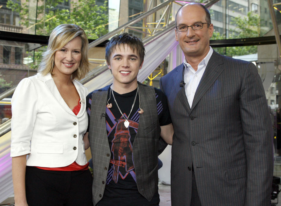 A photo of Jesse McCartney with hosts Melissa Doyle and David Koch on Sunrise in 2006.