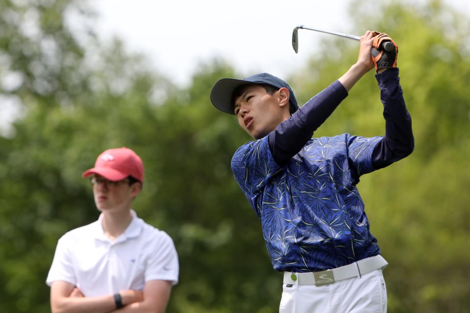 Kevin Wang of Eastchester tees off on the ninth hole in Round 1 of the Section 1 boys golf tournament at Waccabuc Country Club May 15, 2023.