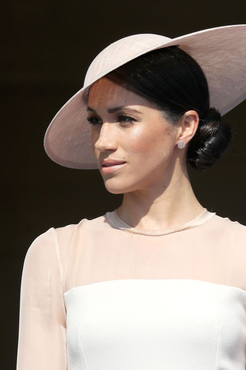 <p>The <a href="https://www.goodhousekeeping.com/life/a19662278/meghan-markle-title/" rel="nofollow noopener" target="_blank" data-ylk="slk:Duchess of Sussex;elm:context_link;itc:0;sec:content-canvas" class="link ">Duchess of Sussex</a> likes to rep <a href="https://www.goodhousekeeping.com/beauty/news/a47608/meghan-markle-messy-bun/" rel="nofollow noopener" target="_blank" data-ylk="slk:loose buns;elm:context_link;itc:0;sec:content-canvas" class="link ">loose buns</a>, but her tighter chignons look super sleek thanks to this quick tip. "For my flyaways, I spray hairspray on a small boar bristle toothbrush (a regular toothbrush also works great!) to lightly brush them down or smooth the hairline," she told <a href="https://www.birchbox.com/magazine/article/meghan-markle-suits-beauty-secrets?" rel="nofollow noopener" target="_blank" data-ylk="slk:Birchbox;elm:context_link;itc:0;sec:content-canvas" class="link ">Birchbox</a>. "This is especially good for a sleek bun when I am off-camera."</p>