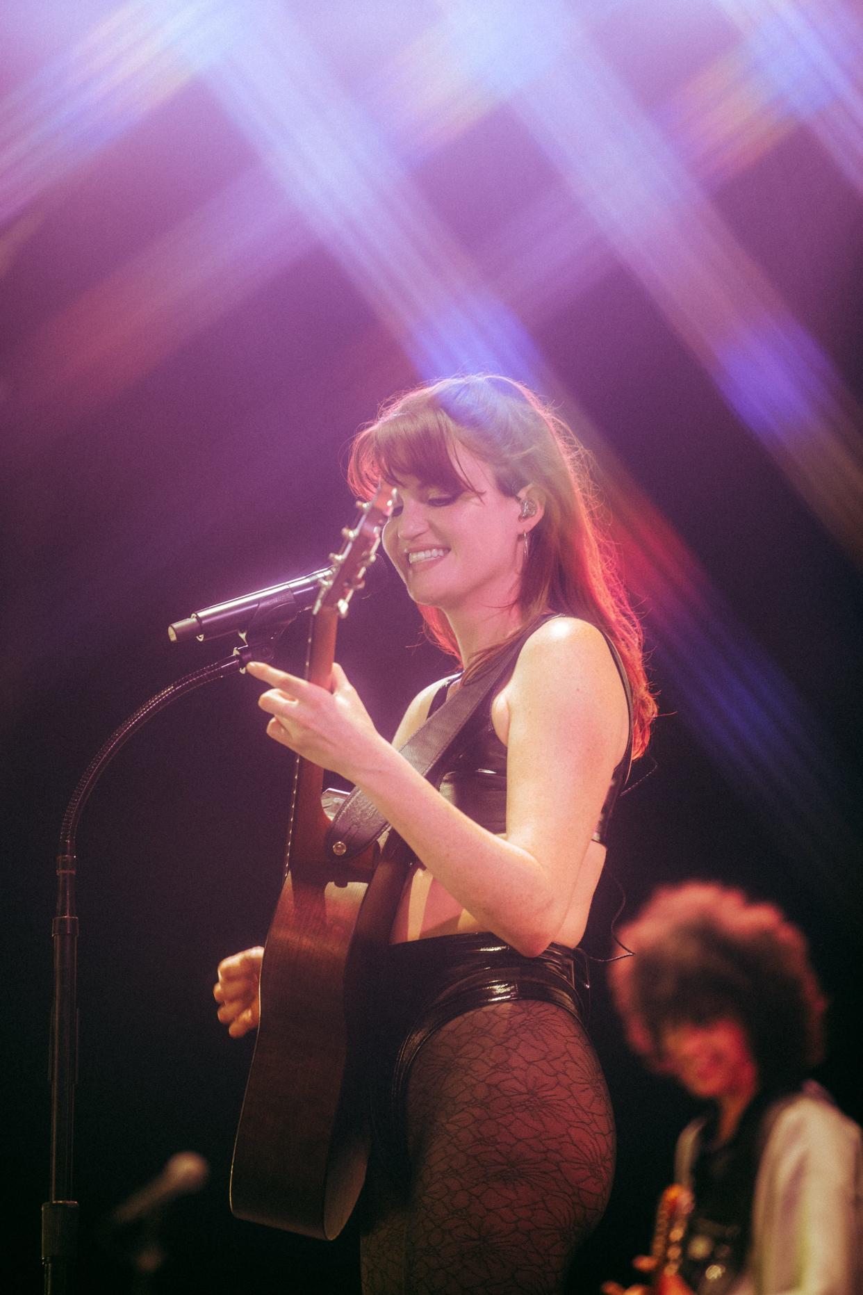 MUNA main vocalist Katie Gavin lights up the Mojave tent at Coachella on Friday, April 14 at Empire Polo Club in Indio, Calif.