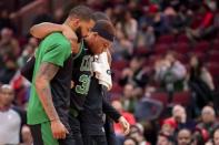 Dec 8, 2018; Chicago, IL, USA; Boston Celtics forward Guerschon Yabusele (30) is escorted off the court after an injury during the second half against the Chicago Bulls at United Center. Patrick Gorski-USA TODAY Sports