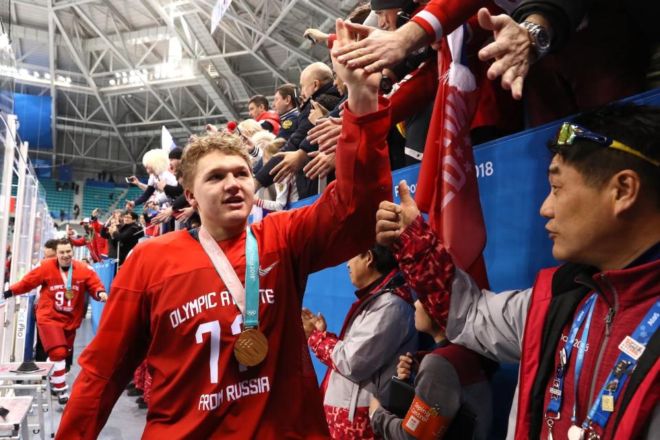 Kaprizov celebrates the Russian team's gold medal at the 2018 Olympics.