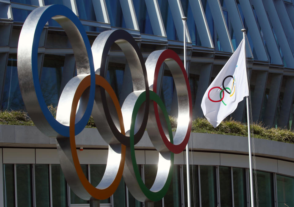 The Olympic rings are pictured in front of the International Olympic Committee (IOC) during the coronavirus disease (COVID-19) outbreak in Lausanne, Switzerland, March 24, 2020. REUTERS/Denis Balibouse