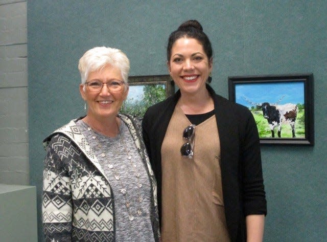 Mary Taylor (left), was named the Artist of the Year for 2020 and 2021 by the San Angelo Art Club. She is shown with the judge of the competition, Dr. Devon Stewart, associate professor at Angelo State University, shortly after the decision was announced.