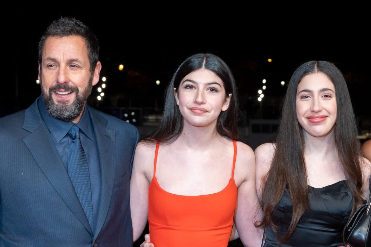 adam sandler, his daughters sunny and sadie, a guest, and wife jackie sandler standing together in evening wear