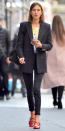 <p>Chung looked effortlessly chic in a pair of black jeans, a plaid blazer-style coat over a yellow cardigan and graphic tee, plus red strappy flats--perfect for a day out and about in the Big Apple.</p>