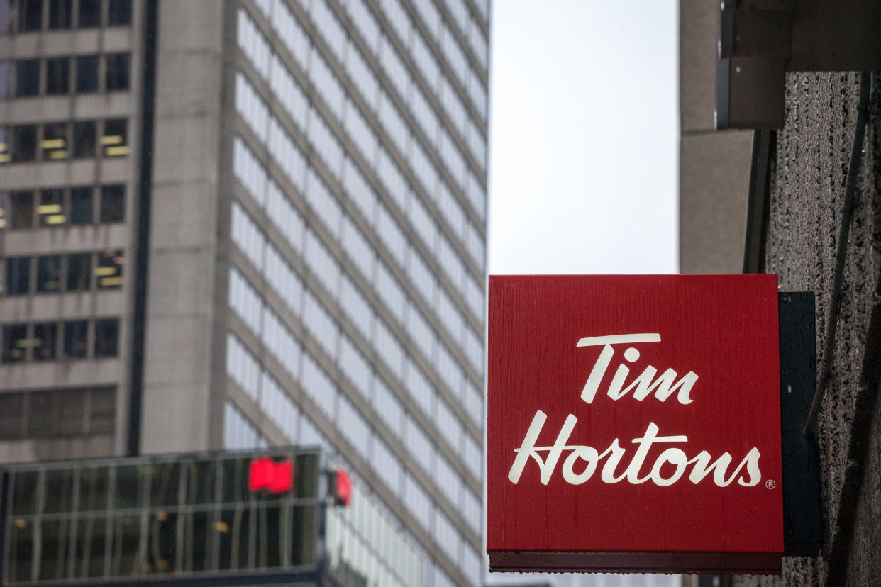 Picture of a sign with the logo of Tim Hortons on their main cafe for  North Montreal, Quebec, Canada. Tim Horton's is a multinational fast food restaurant known for its coffee and donuts. It is also Canada's largest quick service restaurant chain