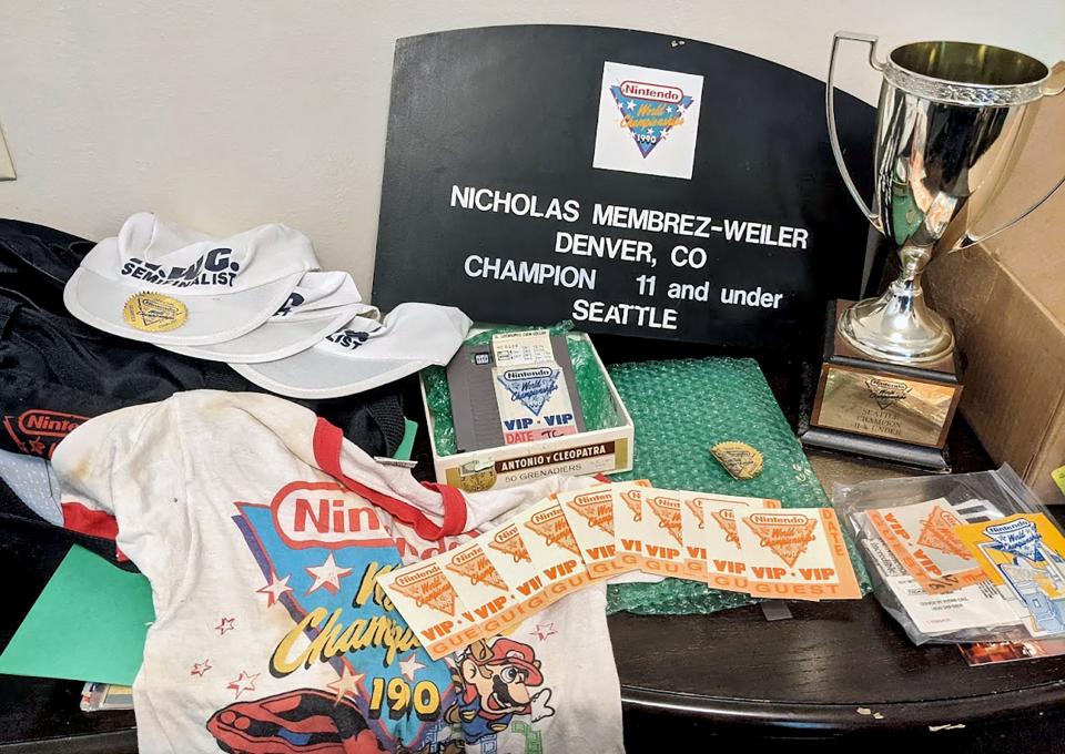 At age 7, Nick Membrez-Weiler, of Norman was the youngest gamer in the inaugural Nintendo World Championships in 1990. He is auctioning memorabilia from the event.