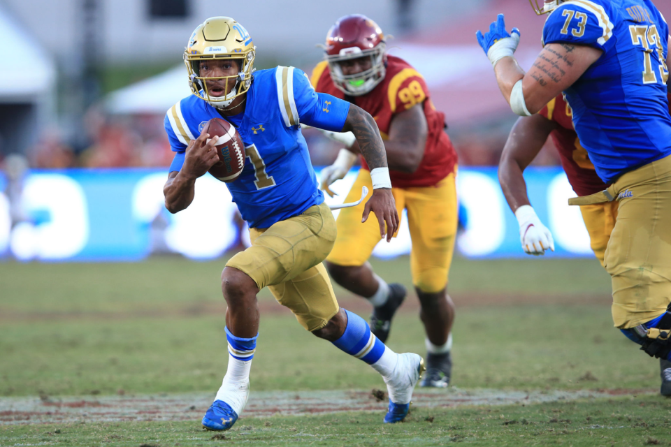 UCLA quarterback Dorian Thompson-Robinson scrambles against USC.