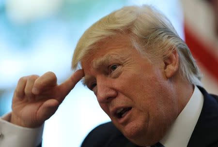 U.S. President Donald Trump speaks during an interview with Reuters in the Oval Office of the White House in Washington, U.S., April 27, 2017. REUTERS/Carlos Barria