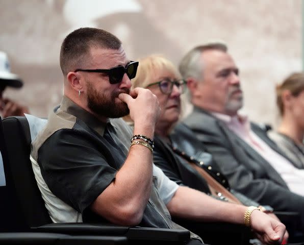 <p>AP Photo/Matt Rourke</p> Travis Kelce (left), Donna Kelce and Ed Kelce in Philadelphia on March 4, 2024