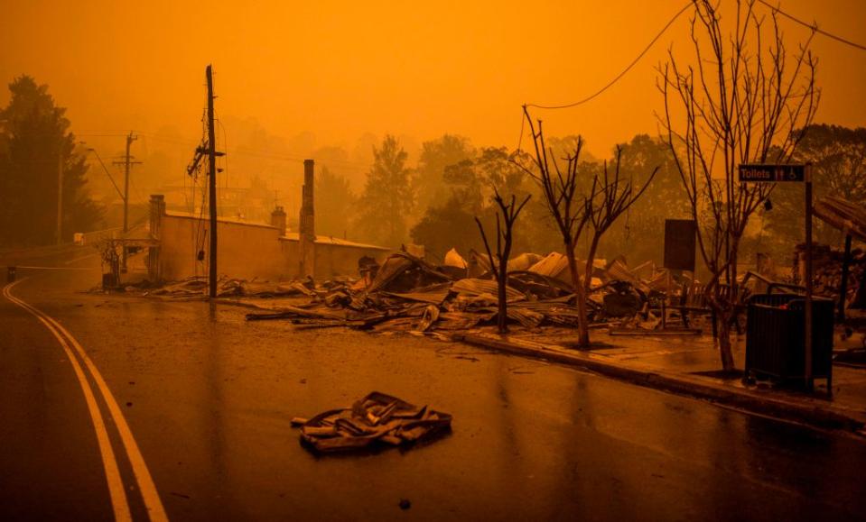 The remains of burnt out buildings are seen along main street of Cobargo. Source: AAP