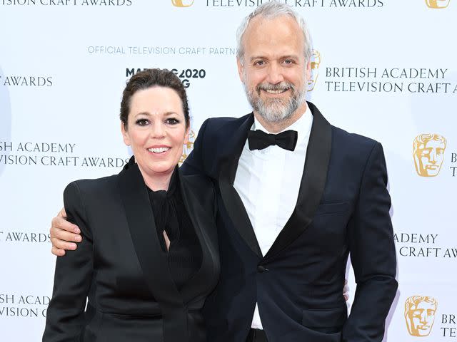 <p>Jeff Spicer/Getty</p> Olivia Colman and Ed Sinclair attend The British Academy Television Craft Awards on April 24, 2022 in London, England.