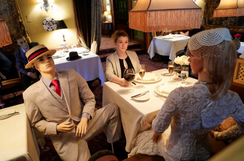 FILE PHOTO: Manniquins help make coronavirus disease (COVID-19) social distancing seem not so distant at The Inn at Little Washington in Virginia