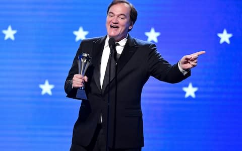 Quentin Tarantino accepting his award for Once Upon a Time... in Hollywood - Credit: getty