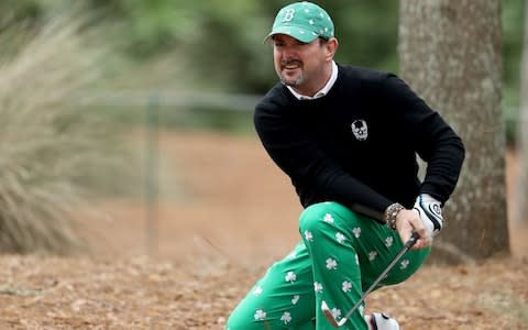 Rory Sabbatini of South Africa plays his second shot on the par 4, first hole wearing a special pair of trousers and hat for St Patrick's Day during the final round of The Players Championship - Credit: Getty Images