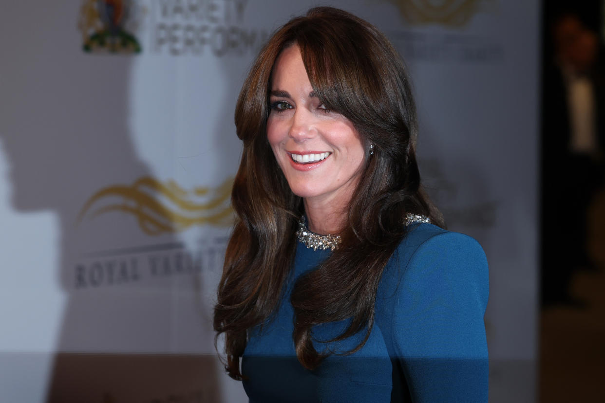 Catherine, Princess of Wales, wearing blue with a diamond necklace