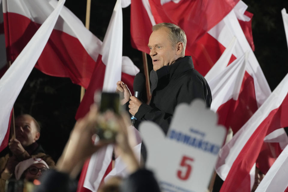 Poland's main opposition leader Donald Tusk speaks to supporters after taking part in an electoral debate in Warsaw, Poland, Monday, Oct. 9, 2023. Leading Polish candidates are holding an energized debate on state TV Monday in which they hope to sway undecided voters, six days before a national election that many Poles believe is the most important one since communism was toppled. (AP Photo/Czarek Sokolowski)