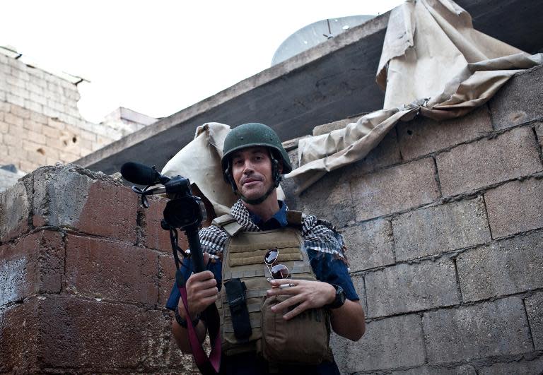 This picture courtesy of Nicole Tung, taken on November 5, 2012 in Aleppo, shows freelance reporter James Foley, who was beheaded in Syria by the Islamic State