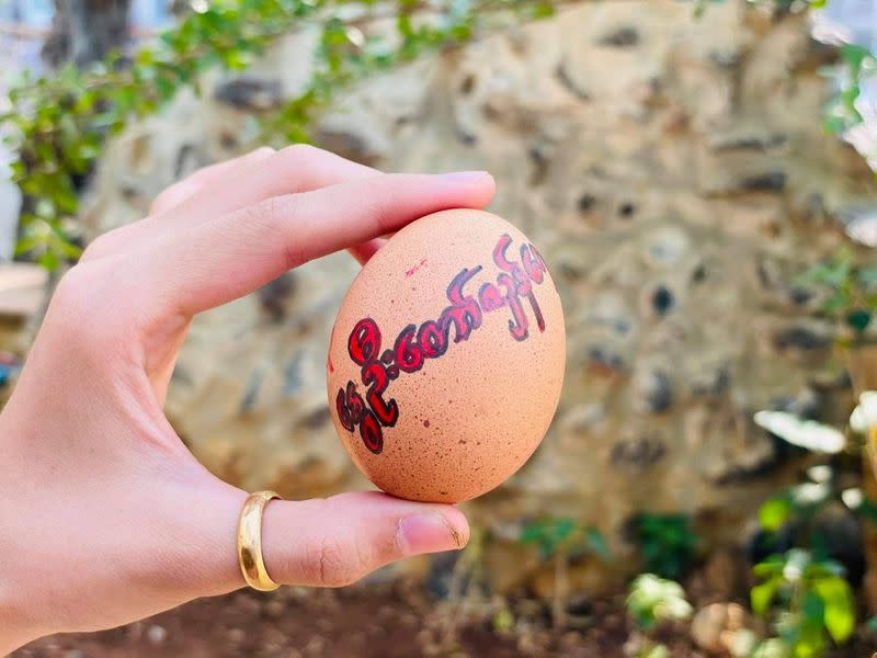 Easter eggs are painted with slogans from the protests against the military coup, in Mandalay