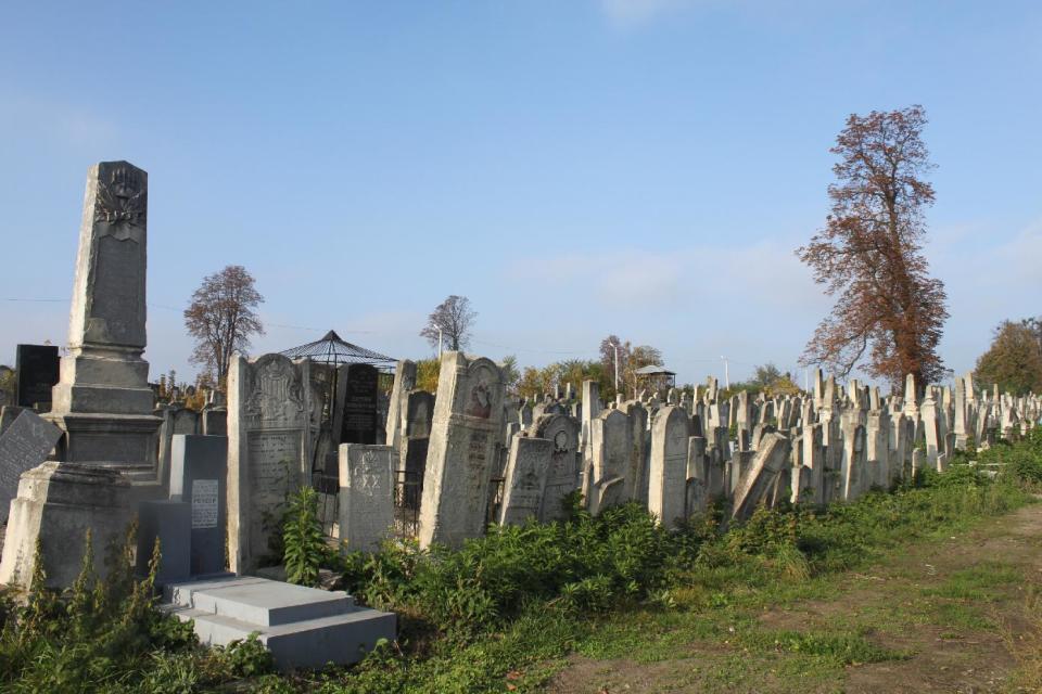 In this photo taken on Oct. 22 2012, the Jewish cemetery, one of the largest in eastern Europe, is seen in Chernivtsi, a city of 250,000 in southwestern Ukraine. Known as the Little Paris or, alternatively, the Little Vienna of Ukraine, Chernivtsi is a perfect place for a quiet romantic weekend trip and a crash course in the painful history of Europe in the 20th century. (AP Photo/Maria Danilova)