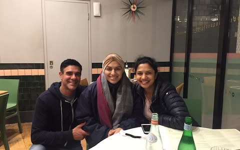 Arora (centre) with her father, Kuldip, and her mother Savi - Credit: Handout