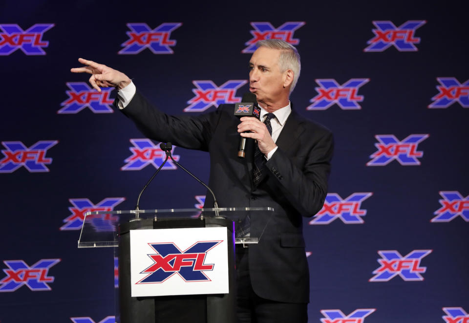 Oliver Luck, XFL Commissioner and CEO makes comments during a news conference where he introduced Bob Stoops as the new general manager and head football coach of the Dallas XFL team in Arlington, Texas, Thursday, Feb. 7, 2019. (AP Photo/Tony Gutierrez)